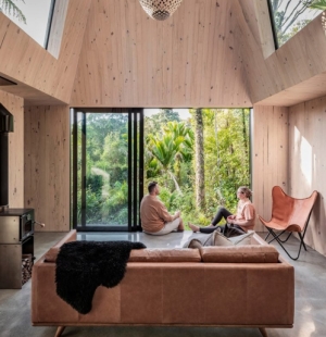 Fabric builds CLT vacation cabin in New Zealand rainforest